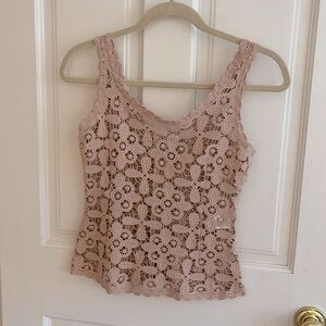 Not lined, floral woven pattern, sleeveless top.